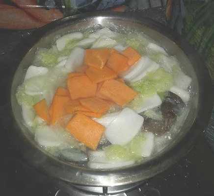 白菜年糕南瓜汤的做法步骤6
