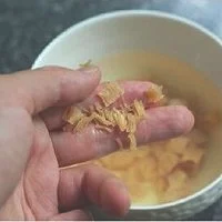 玉米瑶柱排骨粥的做法图解4