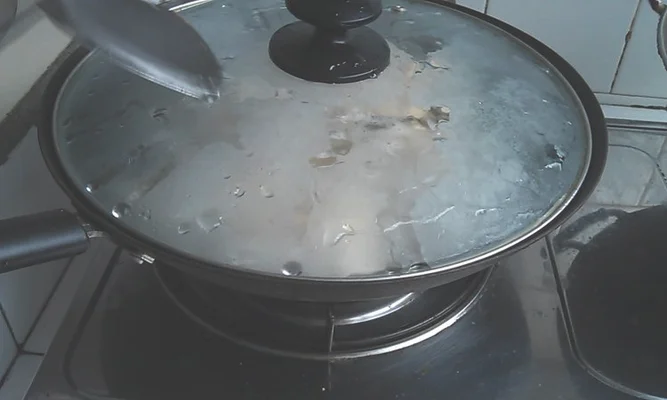 白贝豆腐鱼头汤的做法步骤5